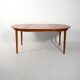 Round extendable teak table by Svante Skogh