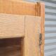 Armoire pied compas en chêne blond