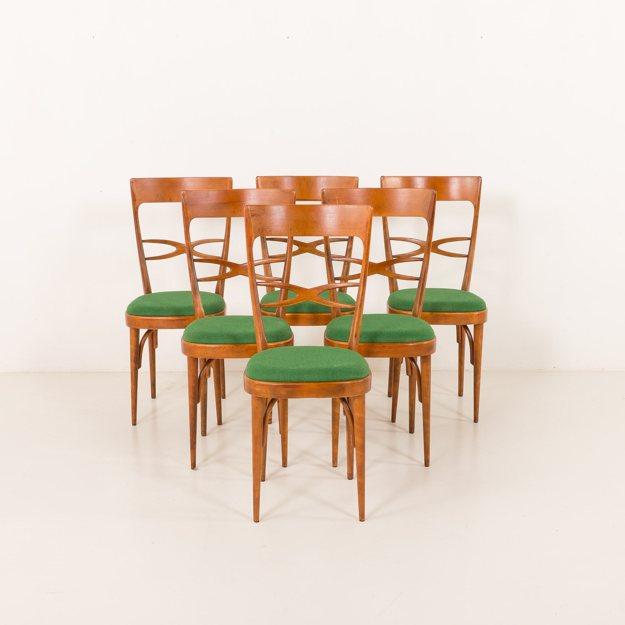 Italian mid-century chairs in walnut and wool