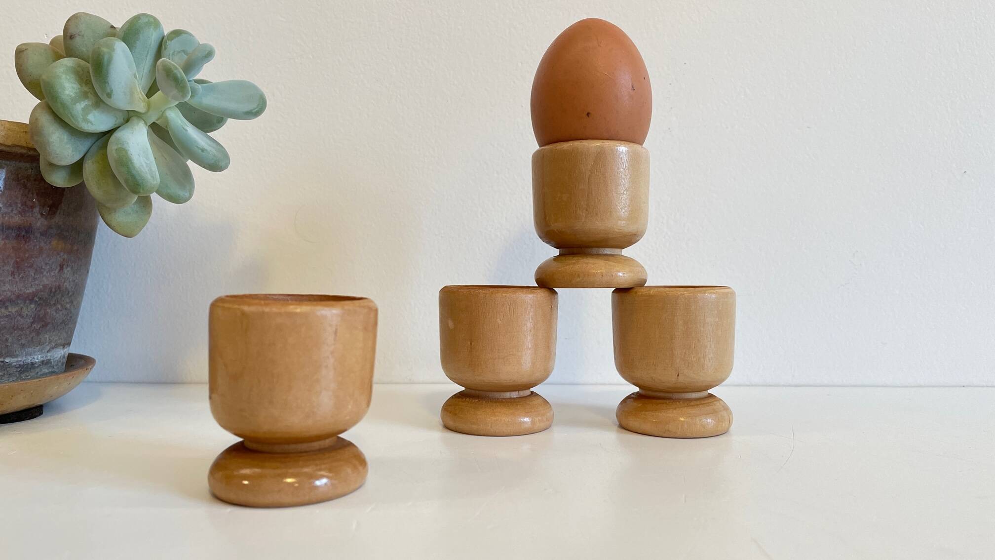 4 vintage turned wooden egg cups