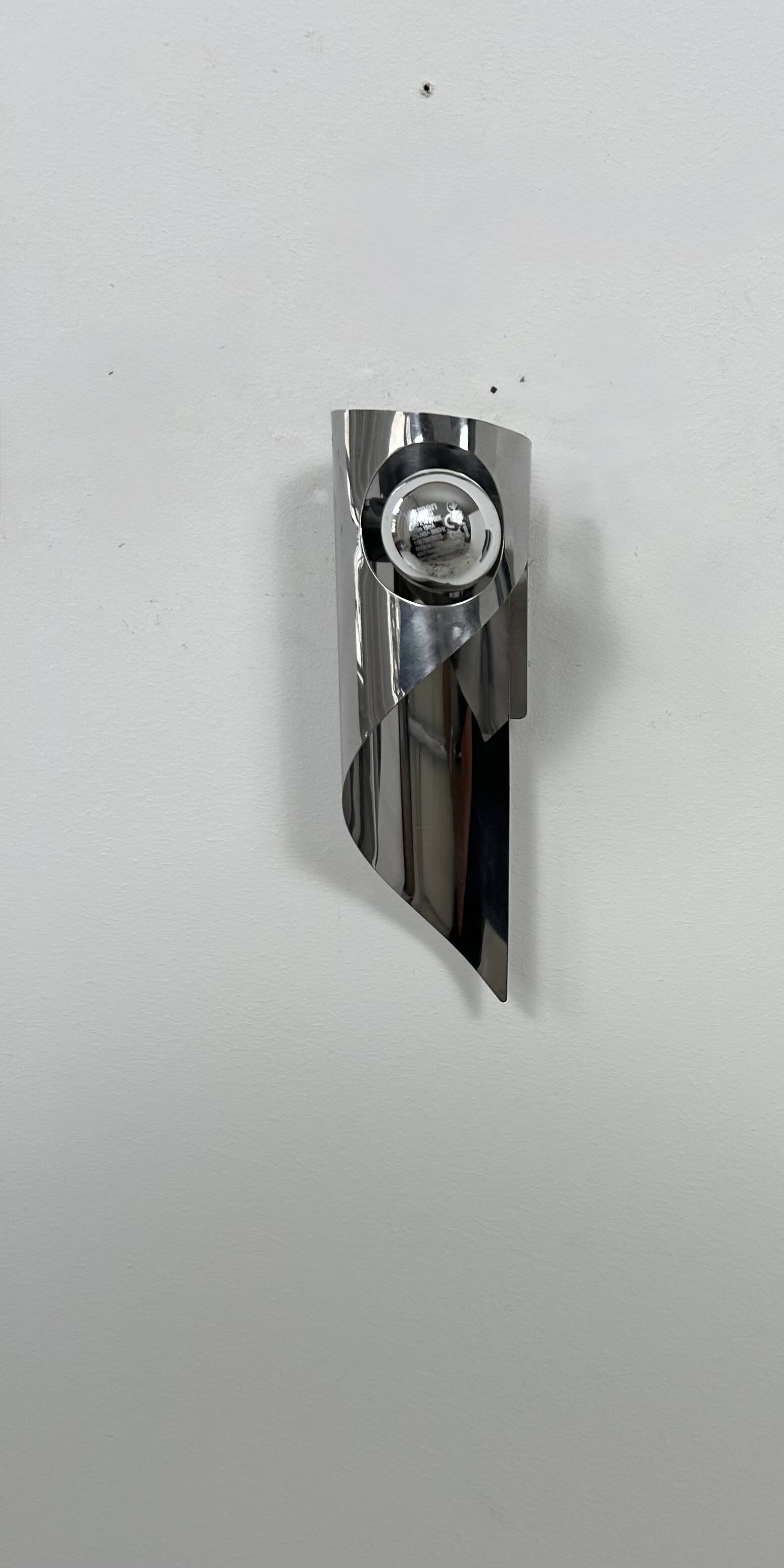 Pair of vintage wall lights, chrome metal, France, 1970.