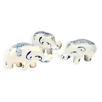 Set of 3 blue and white porcelain elephant decorative figurines.