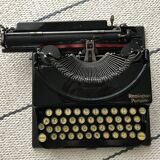 Machine à écrire remington portable en état de marche