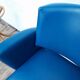 Fauteuil vintage en skaï et pieds métal