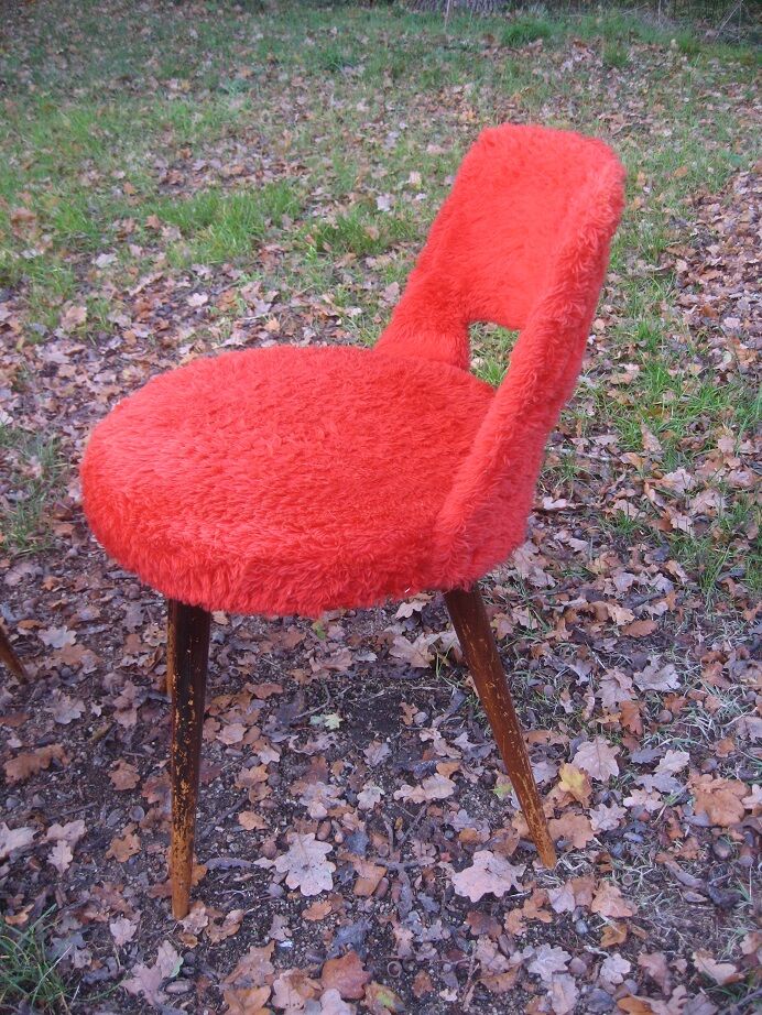 2 chairs red rug seventies
