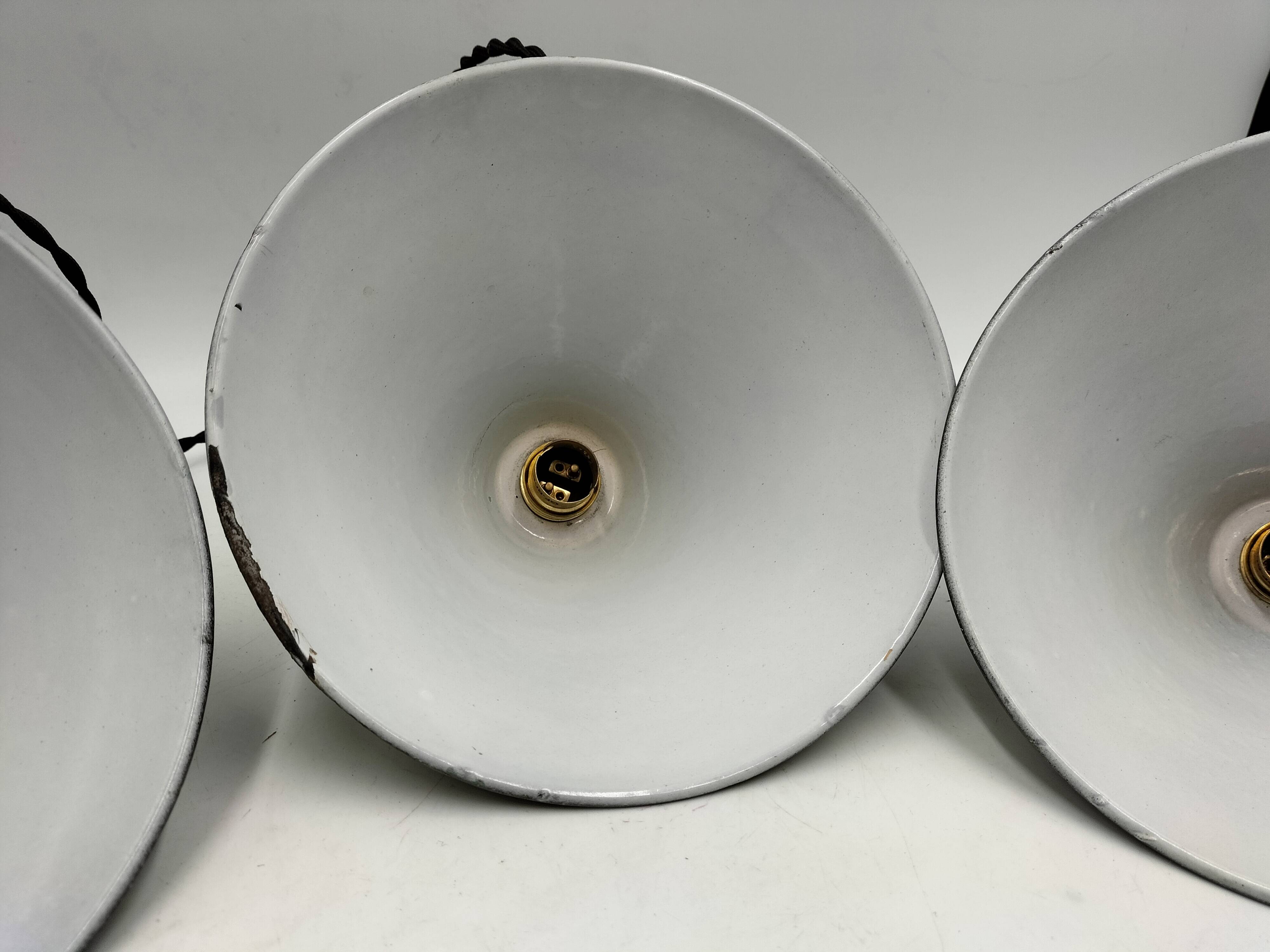 Enamelled sheet metal suspensions