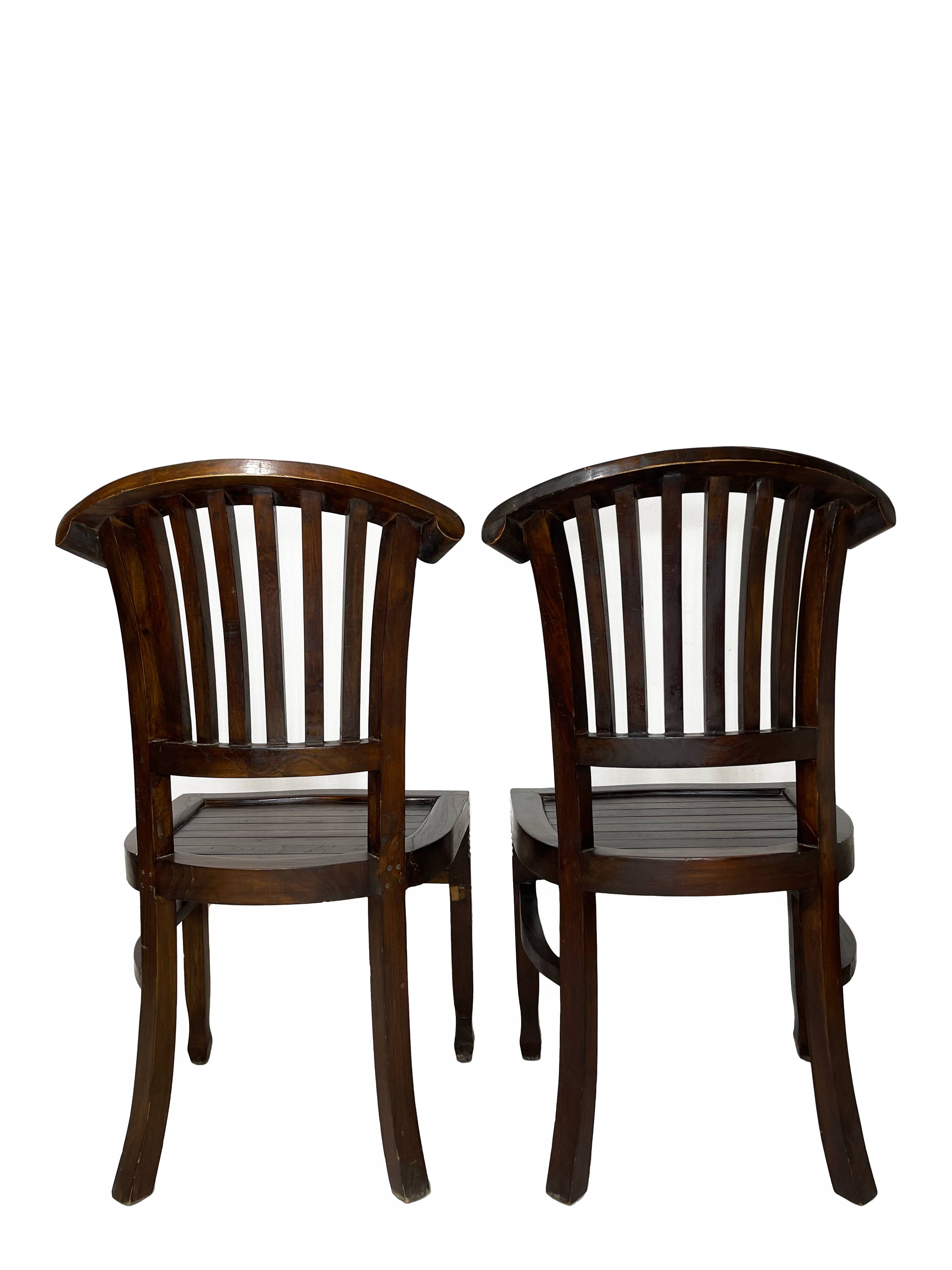 2 chaises coloniales en bois massif, années 1950