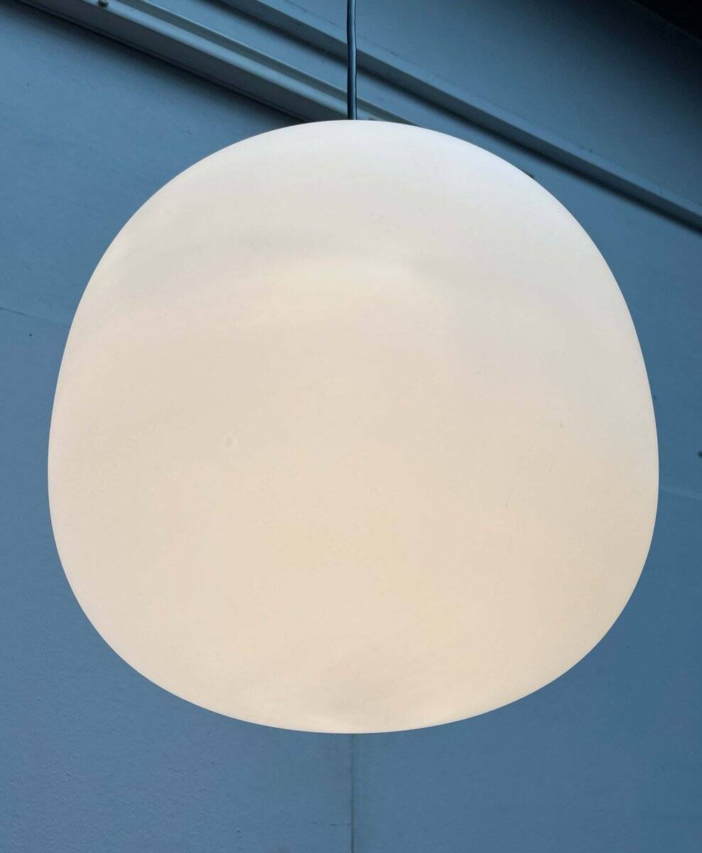 Minimalist suspended glass ball lamp from the vintage German space age by Glashütte Limburg, 1970s.
