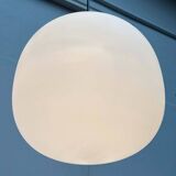 Minimalist suspended glass ball lamp from the vintage German space age by Glashütte Limburg, 1970s.