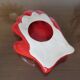 Empty hand-shaped pocket in red ceramic 80s