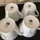 4 fine white porcelain cups with fine flower decoration