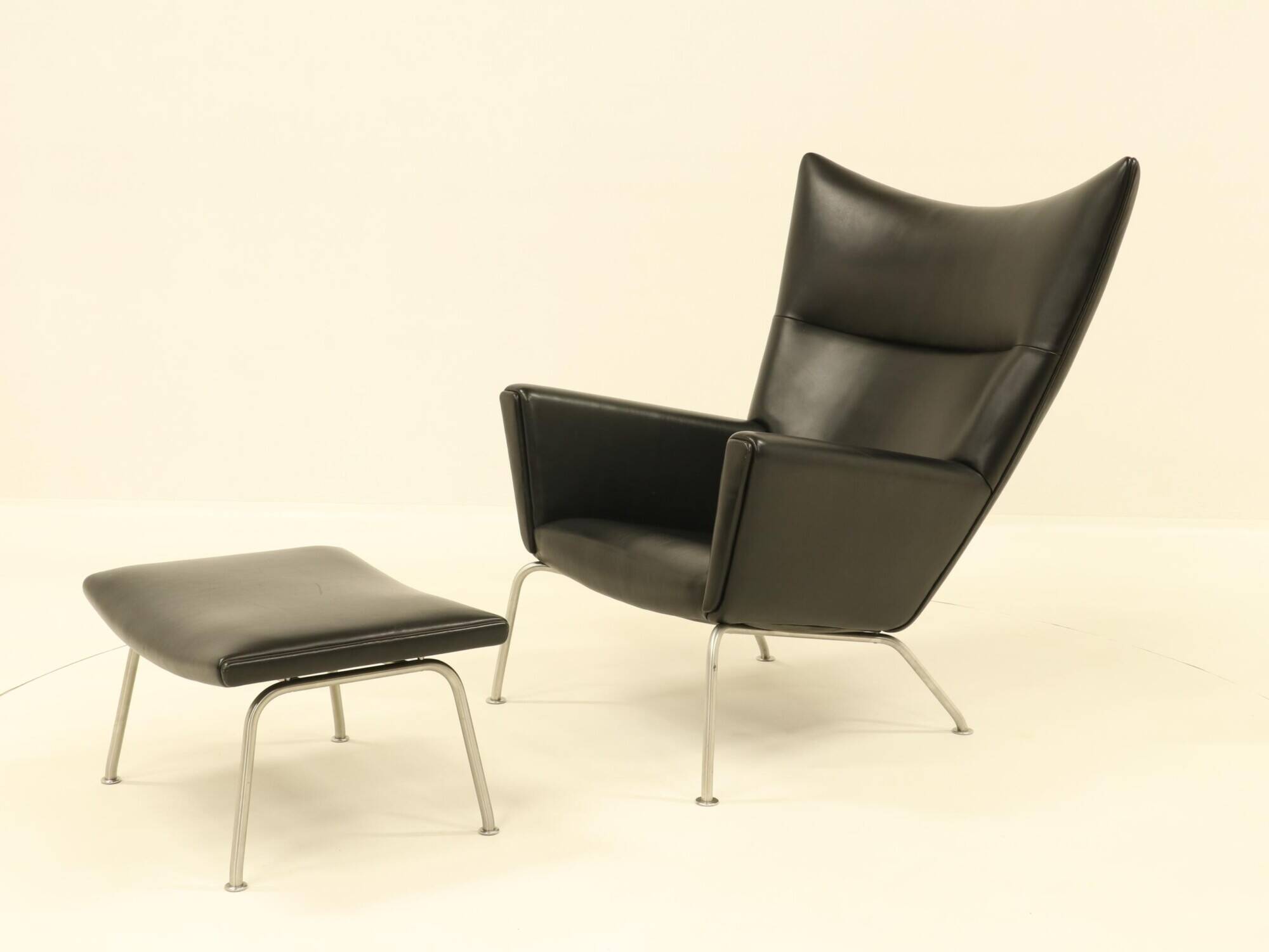 Wing chair & matching ottoman – CH445 & CH446 – by Hans Wegner