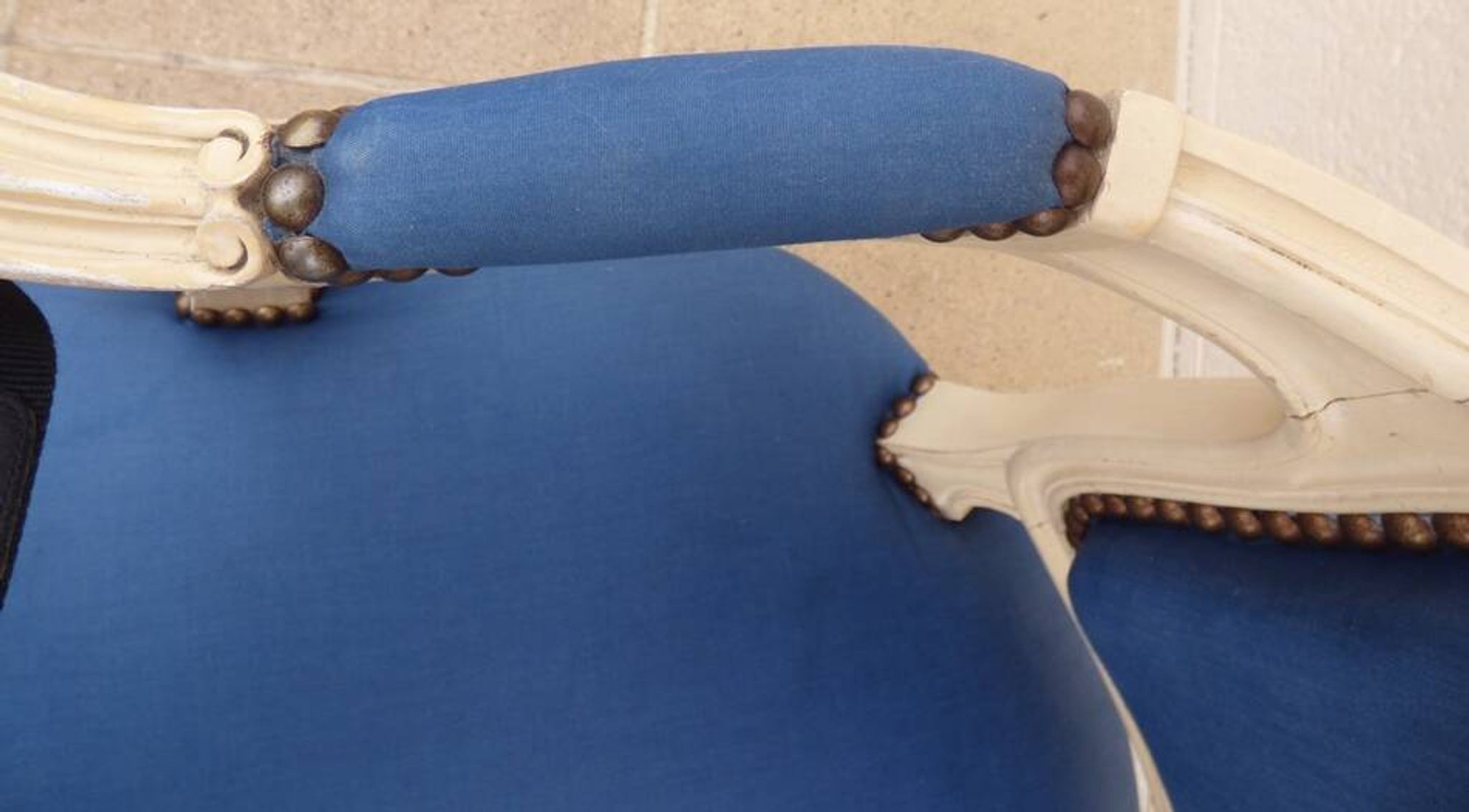 Cabriolet armchair in lacquered wood trimmed in blue satin, Louis XV style