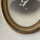 Oval medallion frame in wood and gilded stucco, Louis XVI style knot