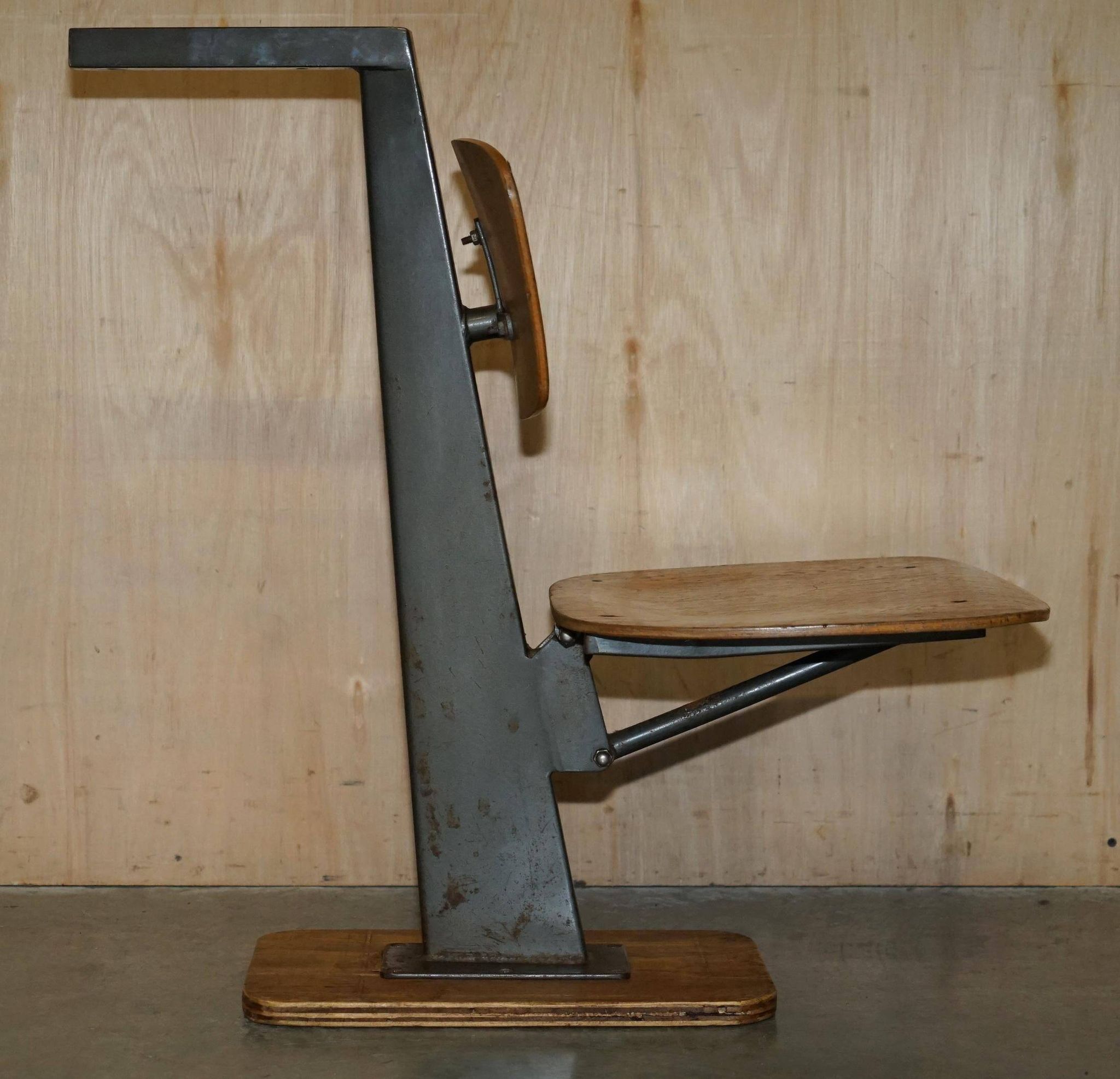Six vintage mid-century modern folding stadium seats with new bases.