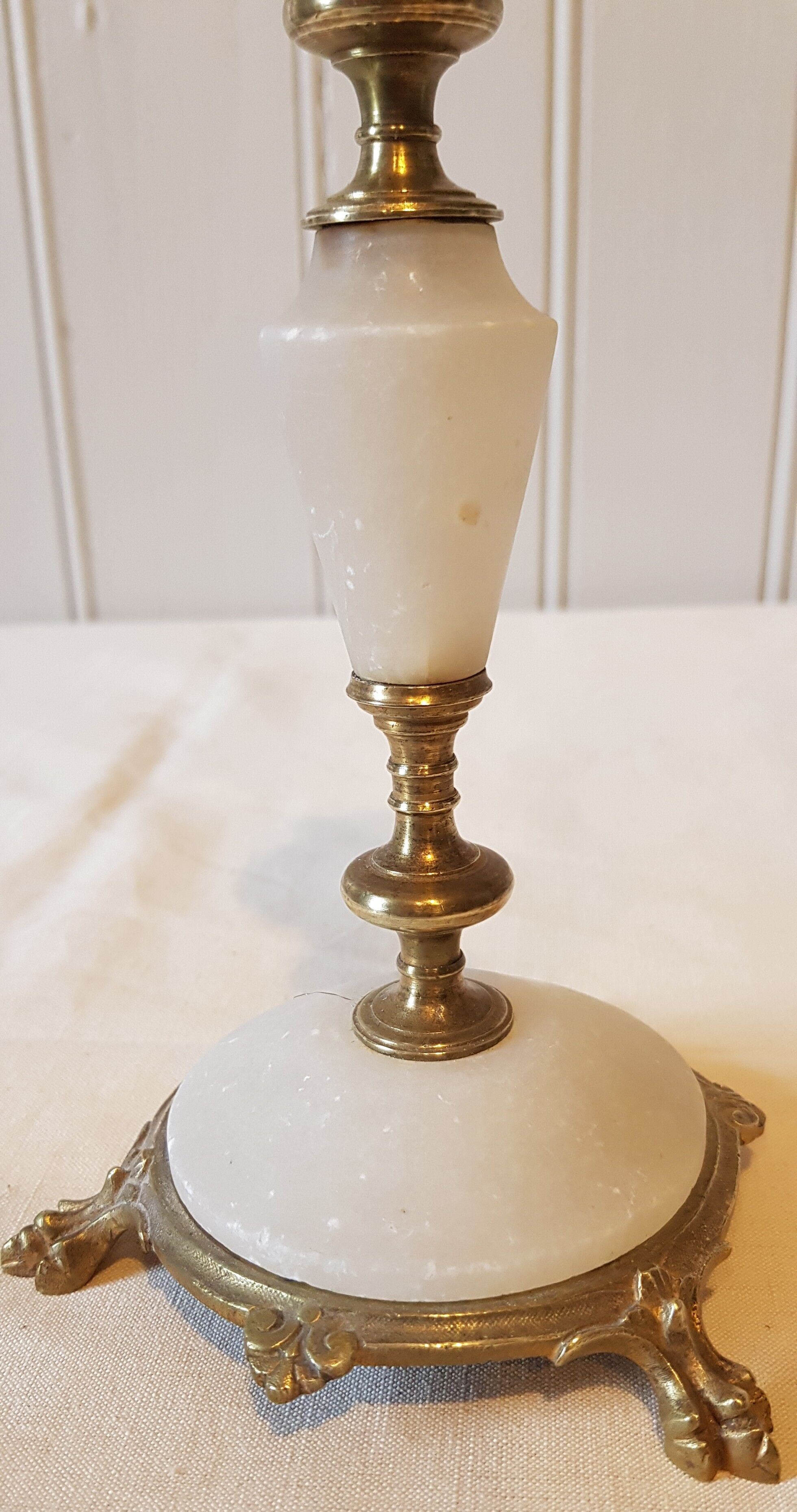 Pair of brass and alabaster candlesticks
