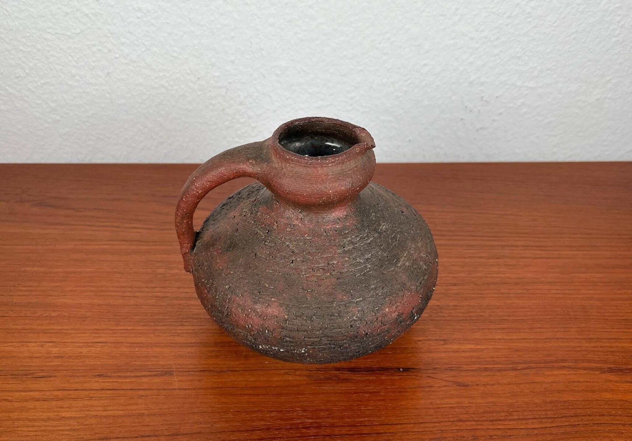 Carafe vase by German studio pottery, brutalist vintage by Gerhard Liebenthron, 1974.