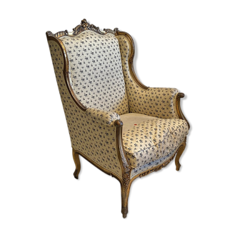 Louis XV style armchair in gilded wood