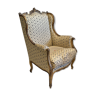 Louis XV style armchair in gilded wood