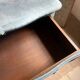 Antique Louis XV style commode, aged finish, practical elegance.