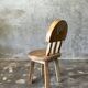 Small child's chair in natural blond teak back with three bars