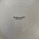 Six slightly hollow Limoges porcelain plates.