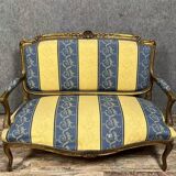 Louis XV style bench in gilded wood, 20th century