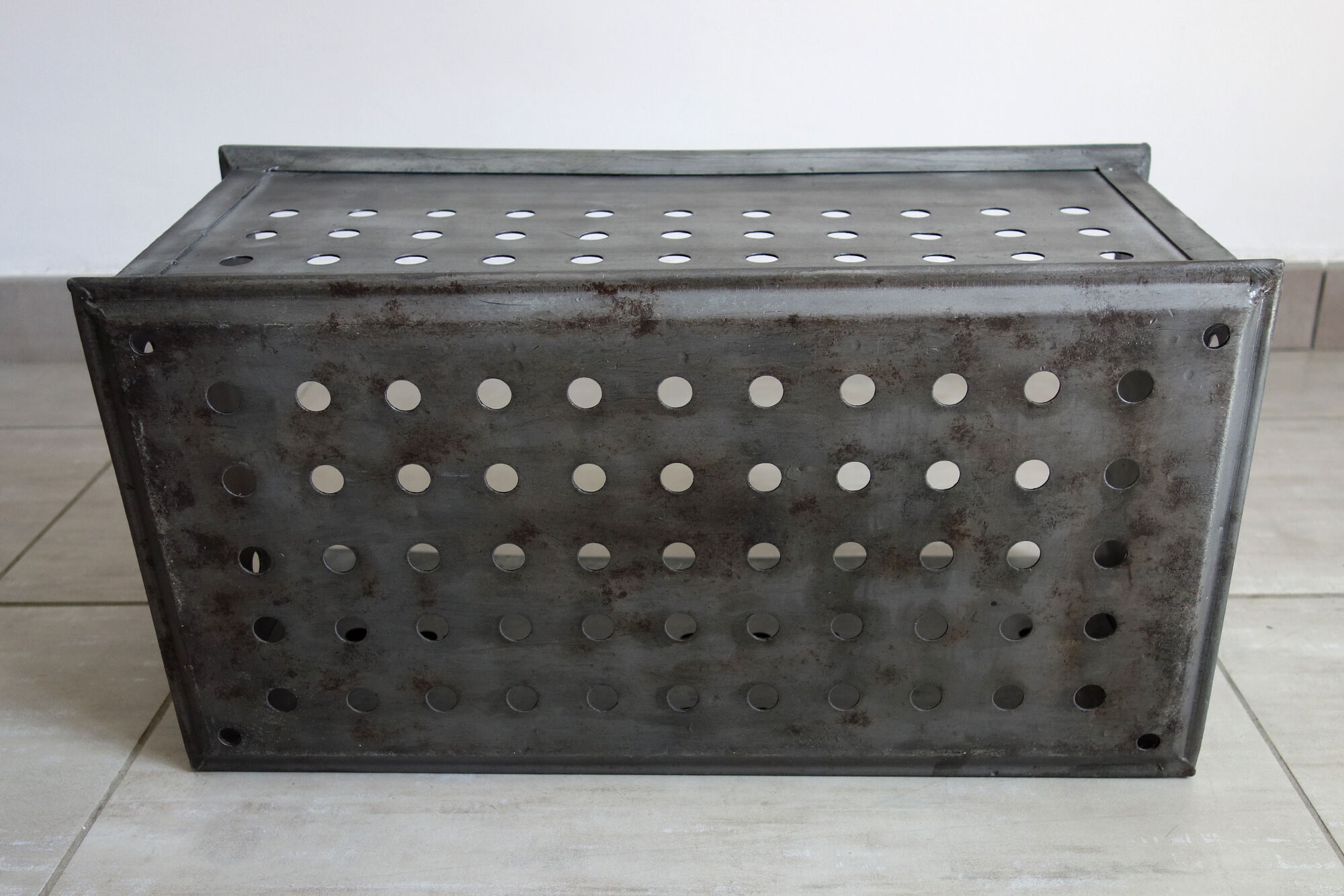 Old industrial box perfoated metal