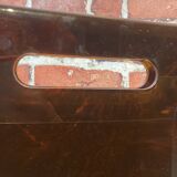 Brown plastic magazine holder with handle