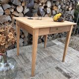 Renovated wooden farmhouse table