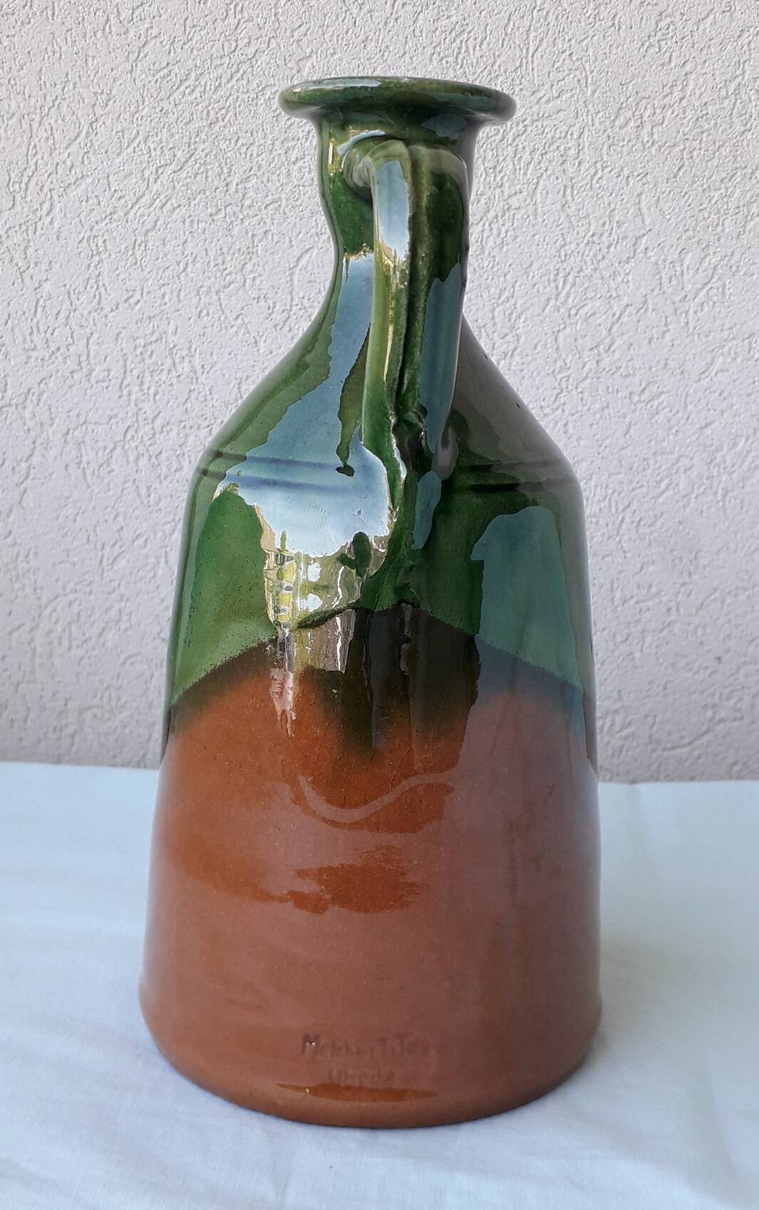 Glazed terracotta jug