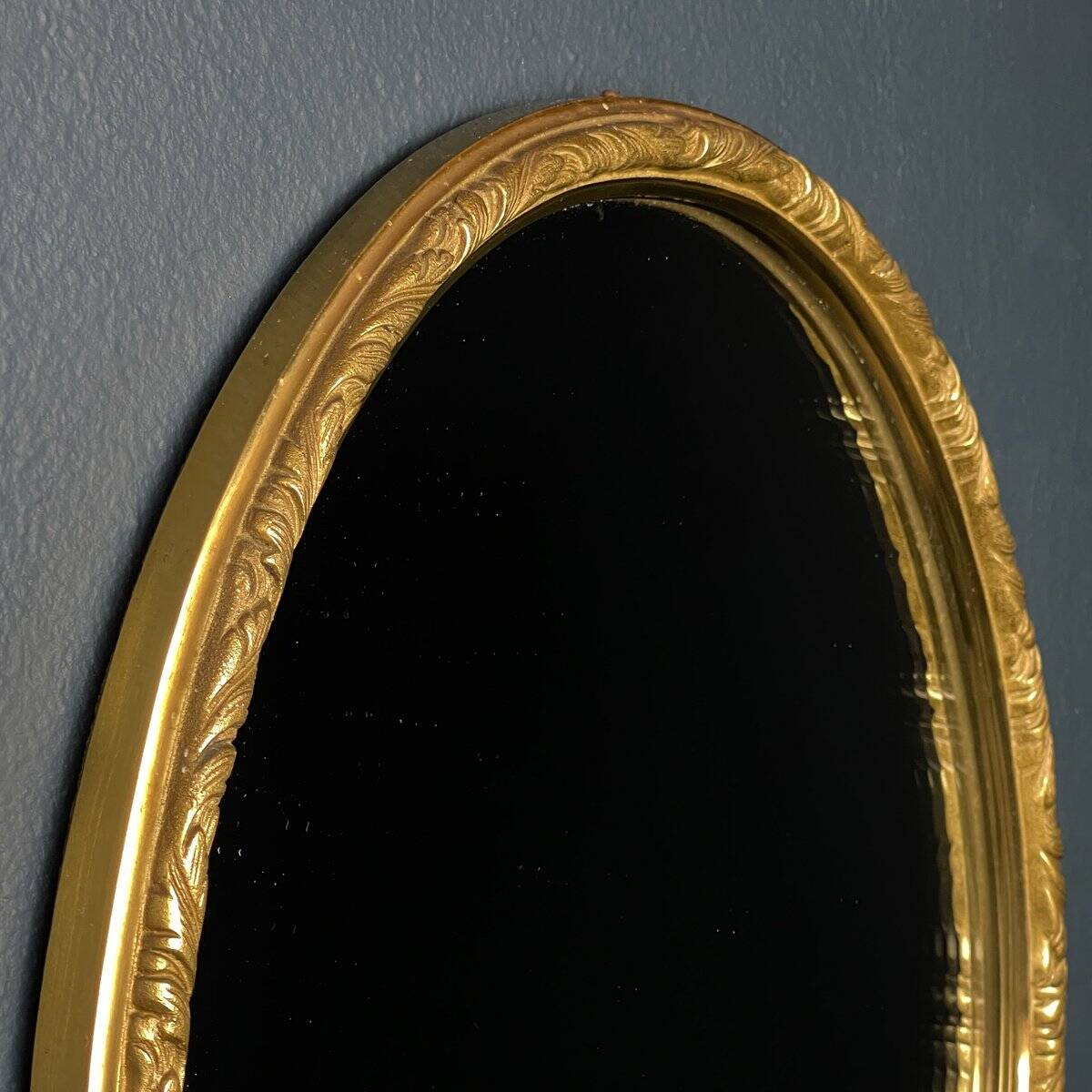 Vintage mirror in a brass frame, Italy, 1950s.