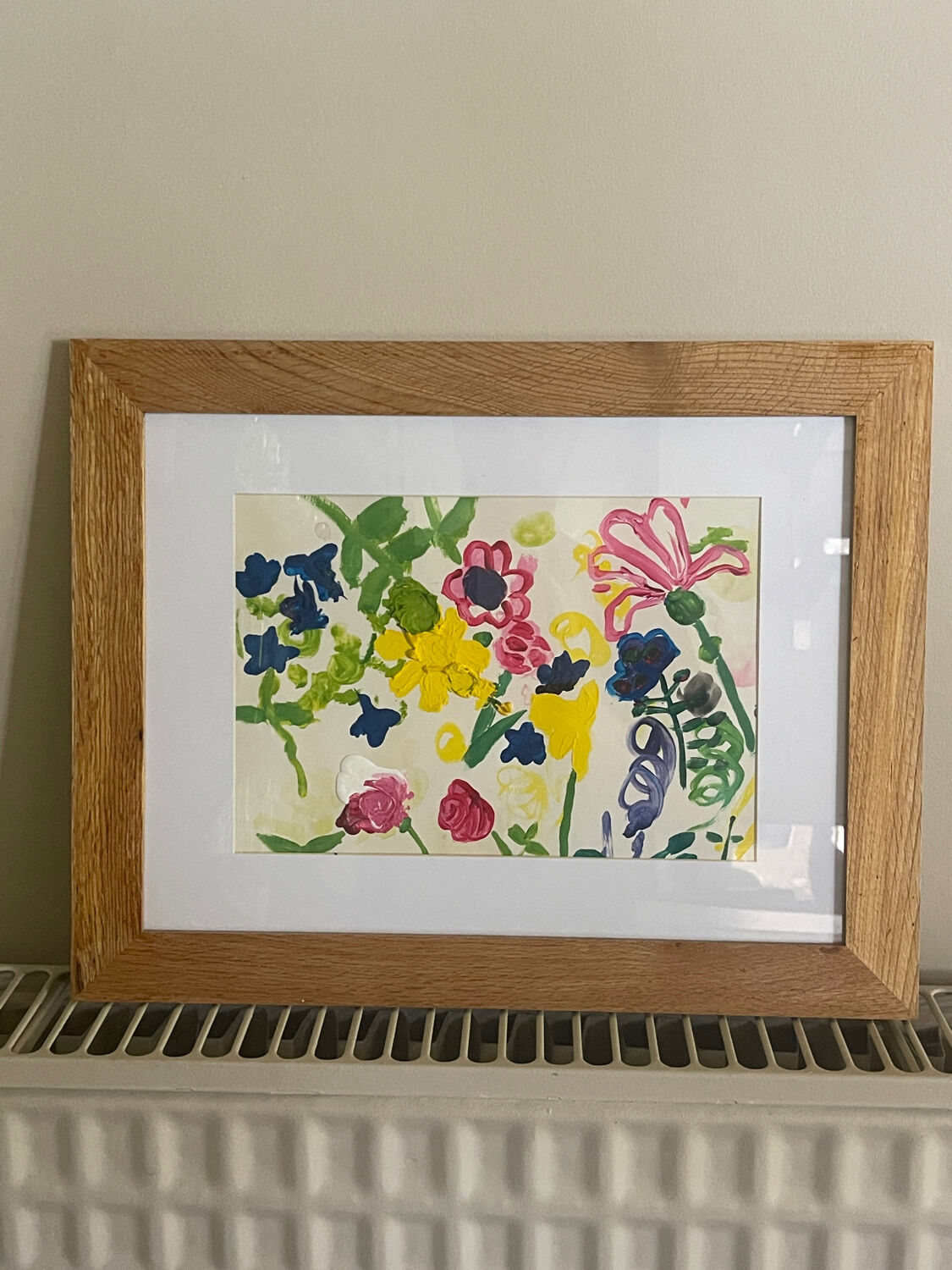 Flower painting in an antique frame