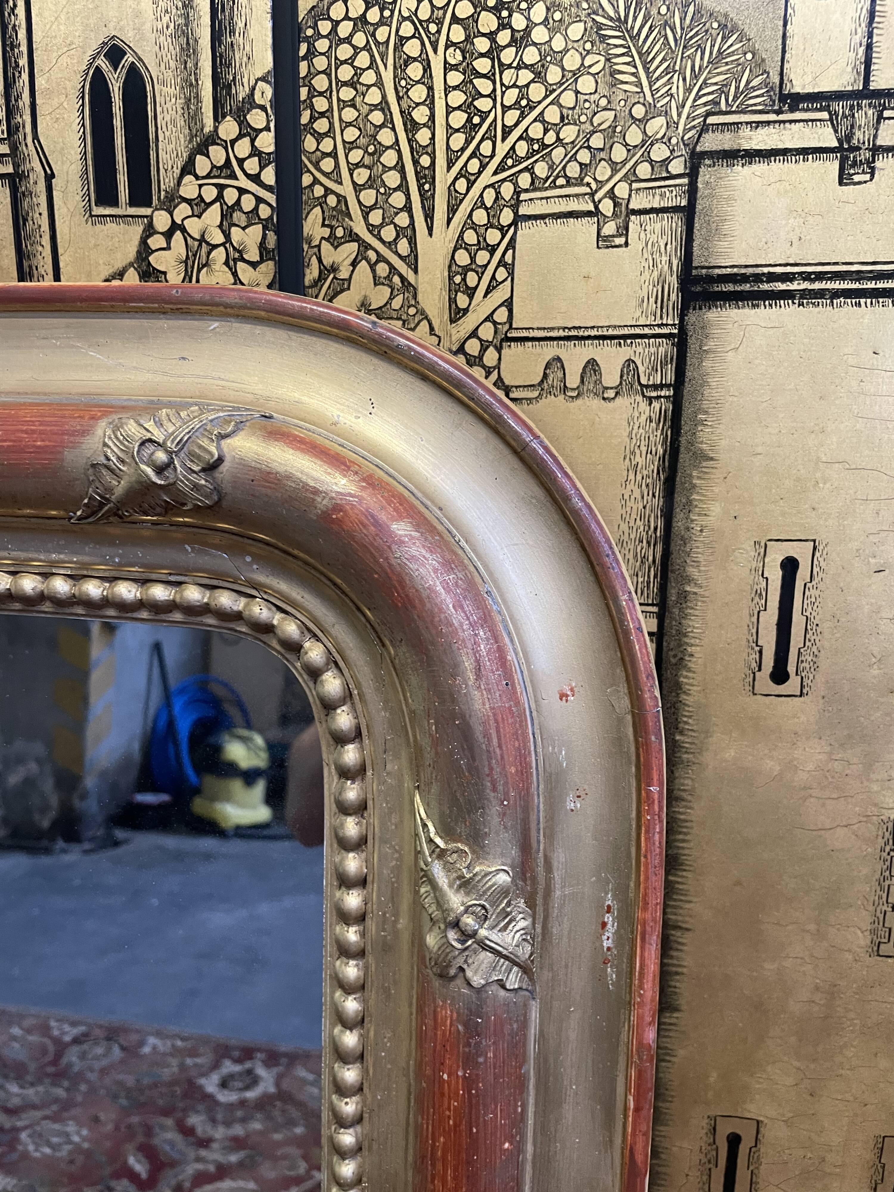 Louis Philippe period mirror in gilded stucco 100x147cm