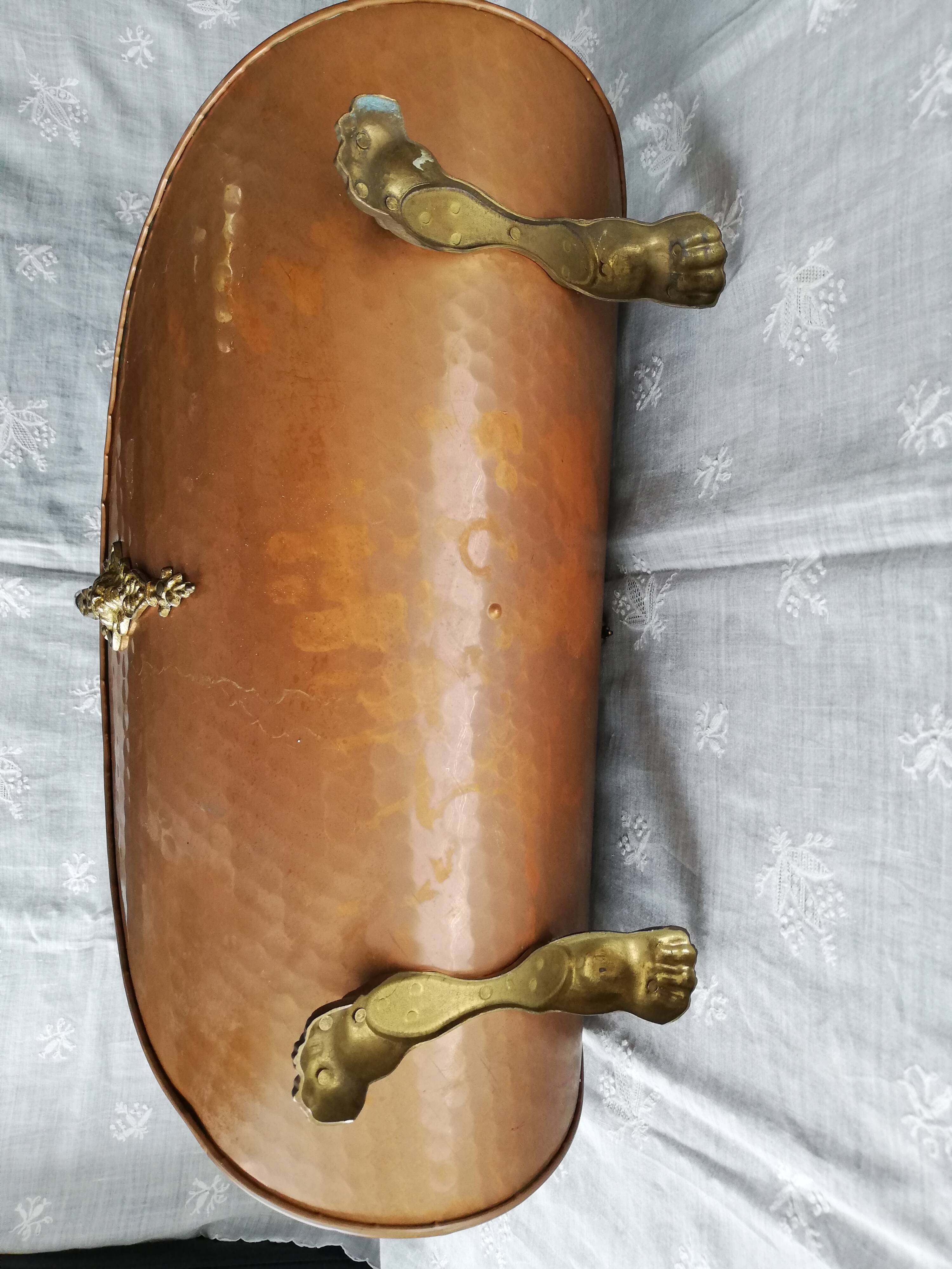 Copper log holder and laison