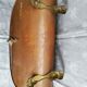 Copper log holder and laison