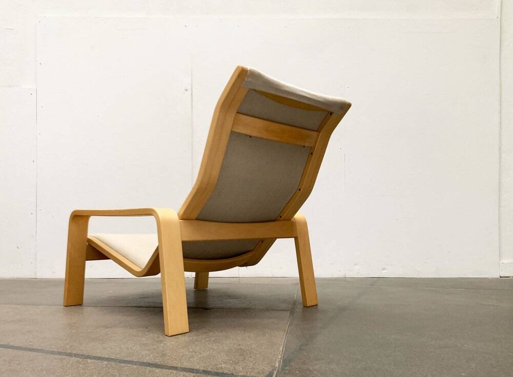 Pulkka lounge chair set in mid-century style with ottoman by Ilmari Lappalainen for Asko, Finland, 1960s.