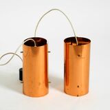 Two 50s tube pendant lamps consisting of two screwed-together copper bowls