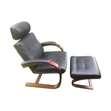 Armchair with its designer footrest Nelo Sweden