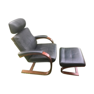 Armchair with its designer footrest Nelo Sweden