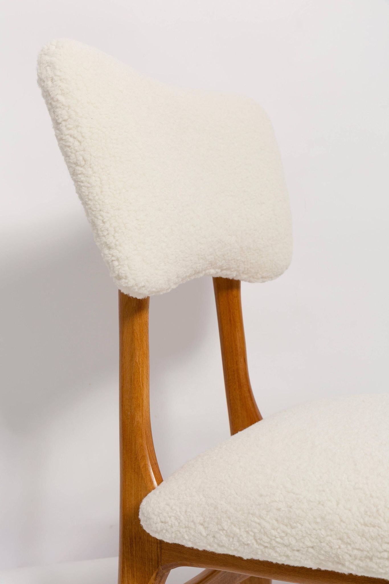 Mid-century "Butterfly" dining chair, light cream boucle, Poland, 1960s