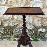 Tripod pedestal table in solid oak, richly carved and molded, 19th century