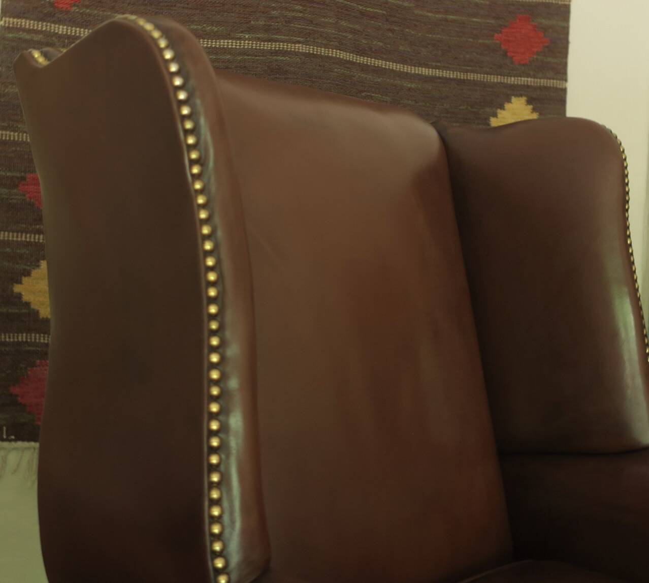 Vintage wingback lounge chair in brown leather, 1970s