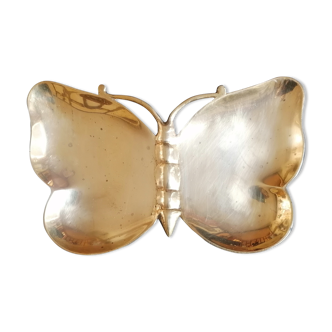 Empty brass butterfly pocket