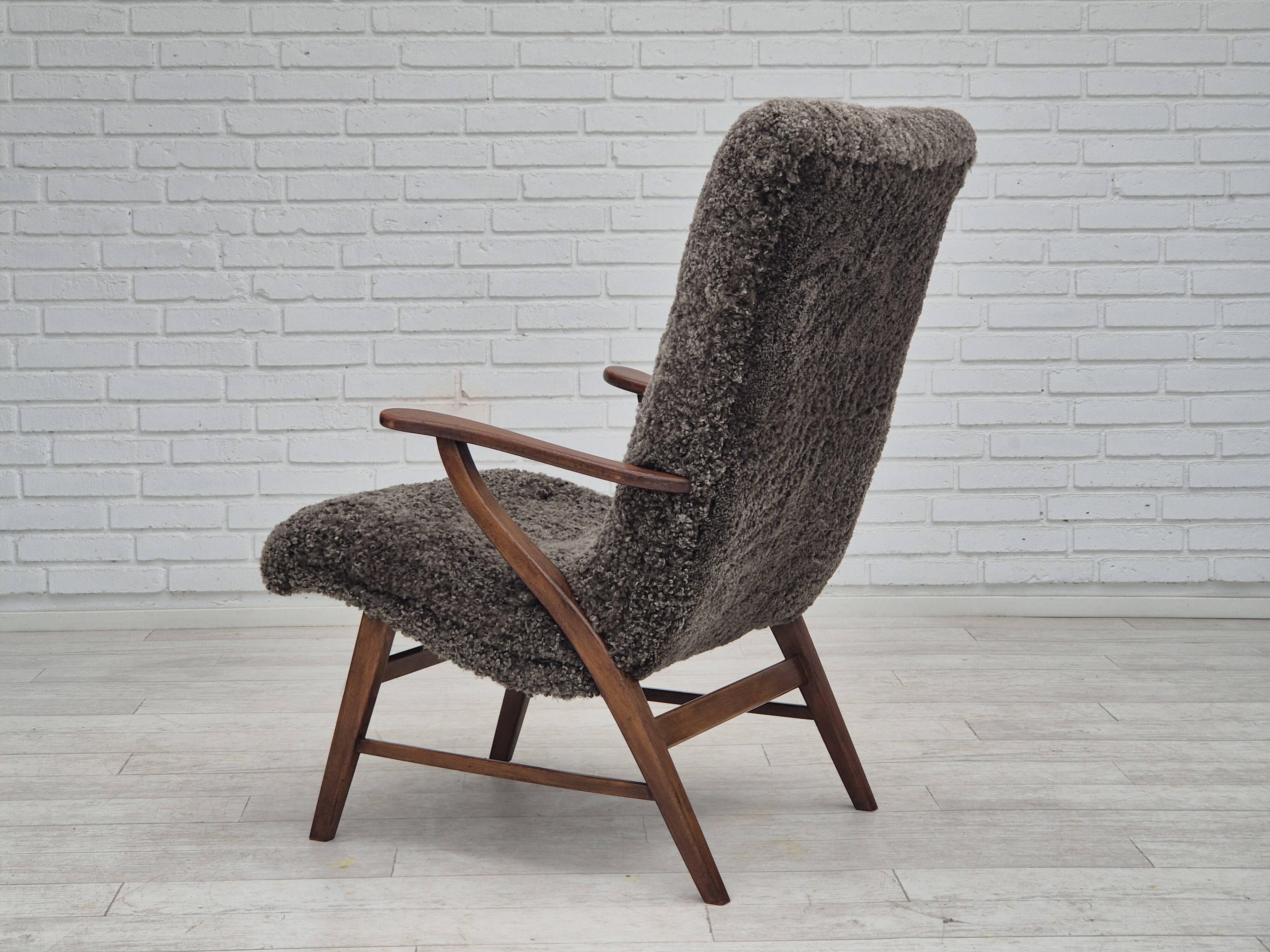 60s, Danish design, refurbished armchair, genuine sheepskin "Wellington".
