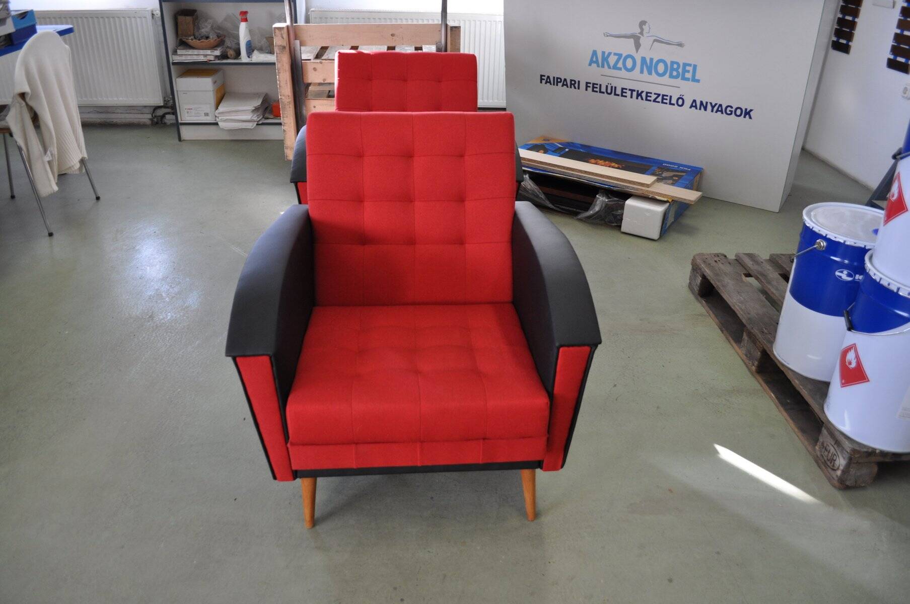 Pair of vintage red fabric armchairs with light wood legs from the 1960s.