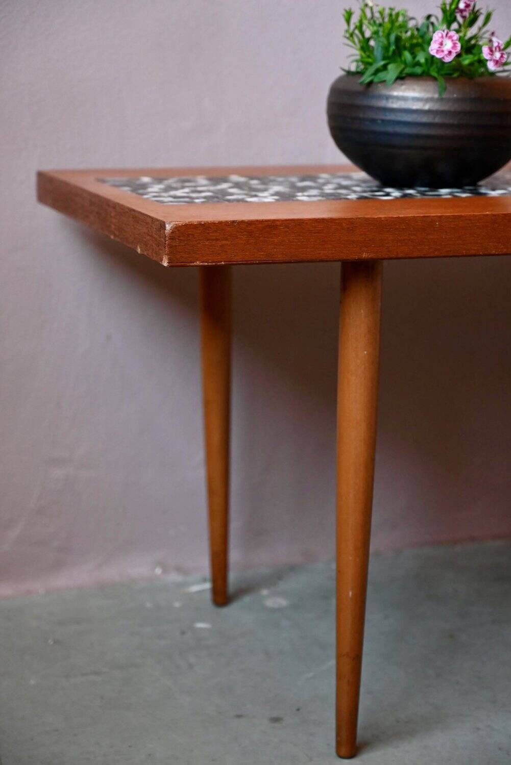 1970s coffee table with a tapered teak base and ceramic mosaic.
