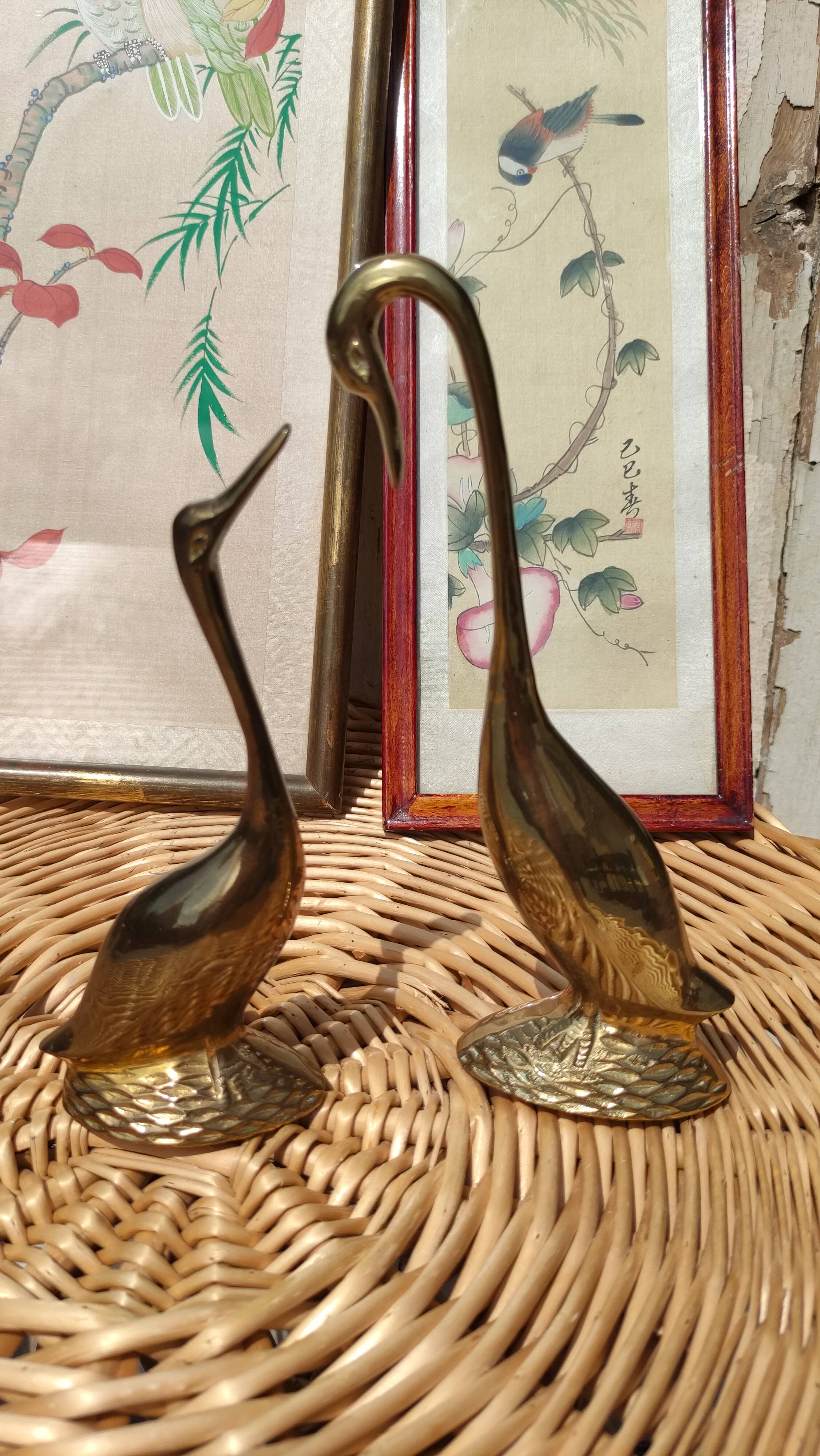 Duo of golden brass swans