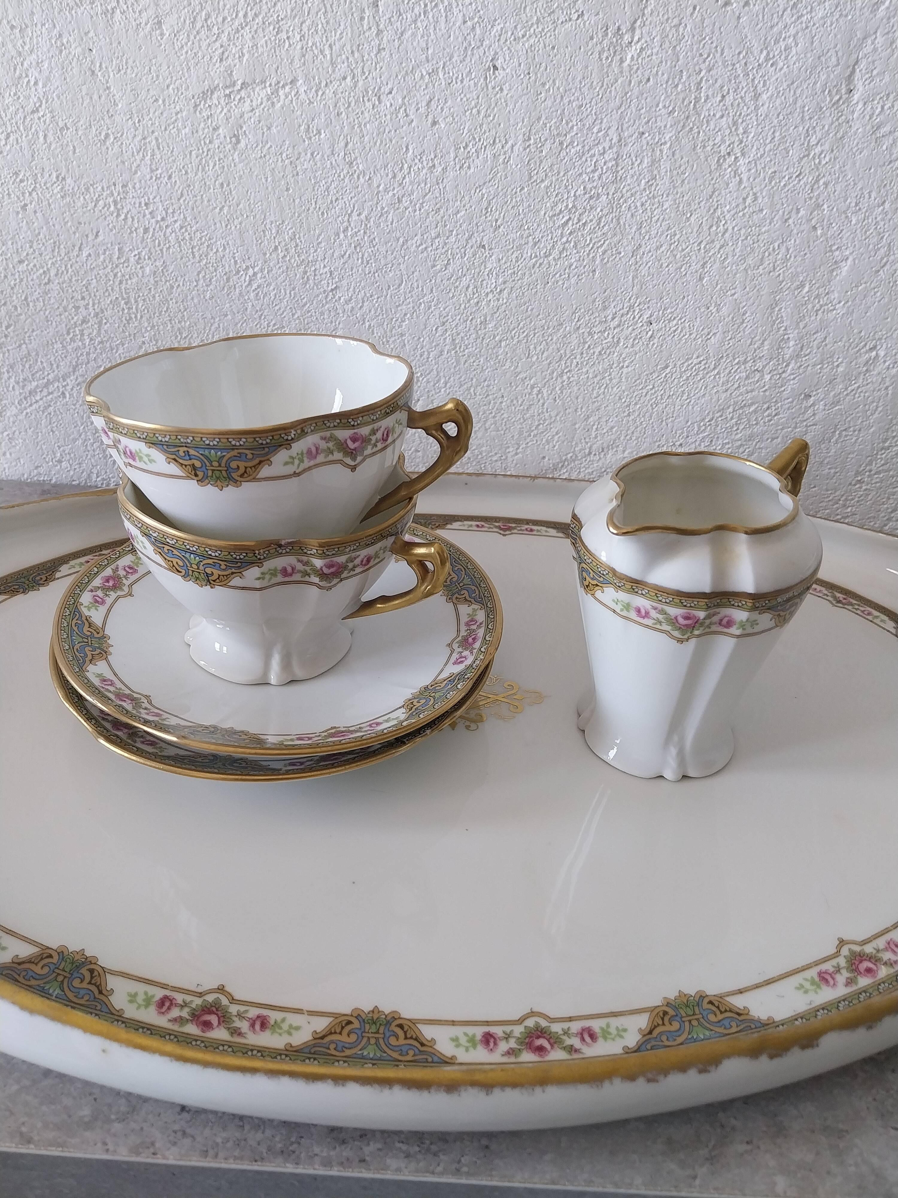 Coffee and tea service for two with its tray in Limoges porcelain.