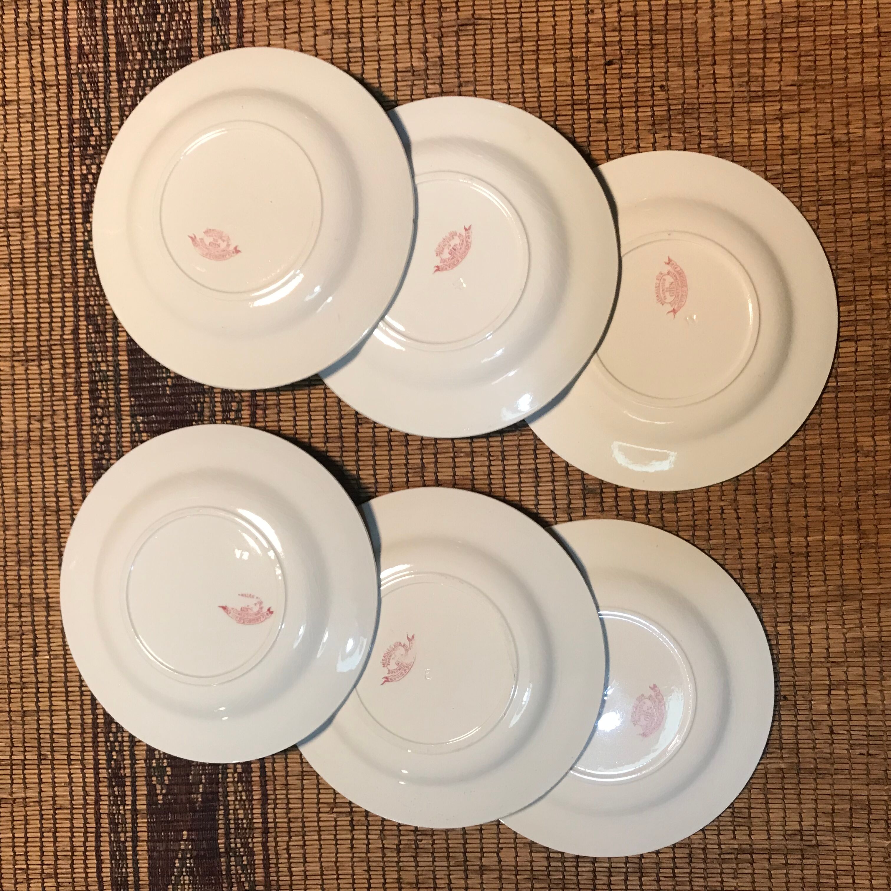 6 vintage pink Shabby dessert plates seen from the east